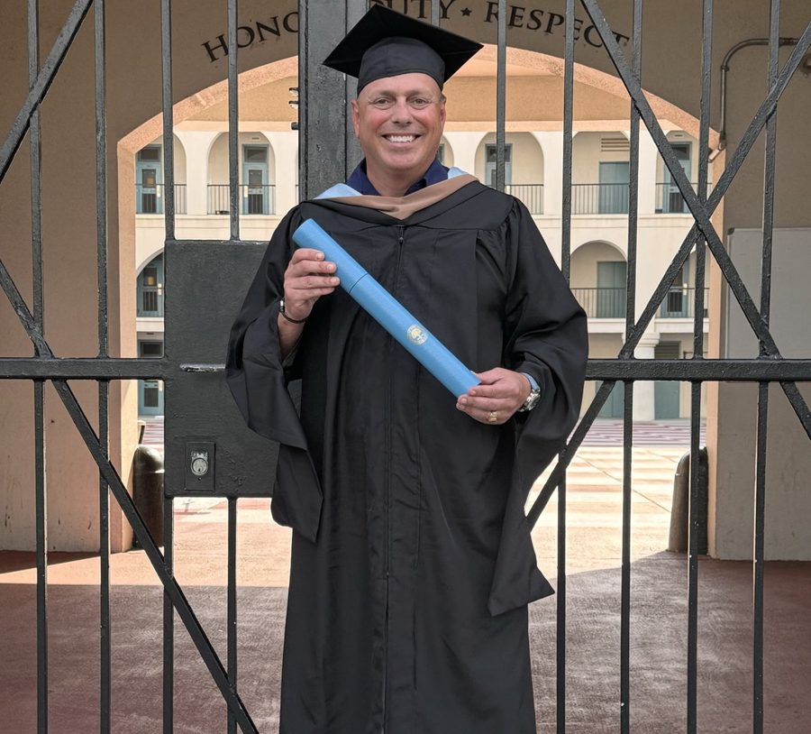 Kenny Stoddart in graduation robes at The Citadel