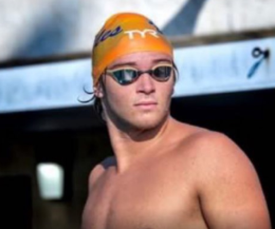 Wyatt Porch in cap and goggles on the pool deck